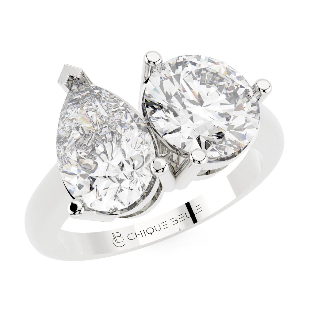 Moi Pear And Round Diamond Ring